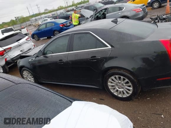 ✅ 2013 Cadillac CTS Luxury • VIN: 1G6DG5E52D0111849 • Lot: 42130235. Wystawiony na IAAI z przebiegiem 129 993 mil. Bezpłatny archiwum sprzedaży aukcyjnych z USA i szczegółowy raport historii pojazdu na DreamBid. Zdjęcie 14.