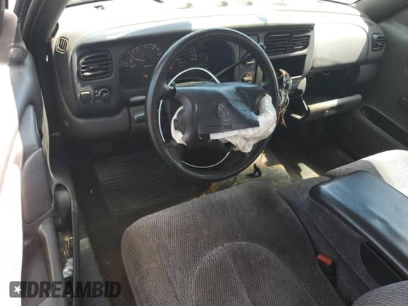 1998 Dodge Dakota SLT z VIN 1B7GL22X2WS567075, wystawiony jako Copart lot #69710974 z przebiegiem 151 920 mil mil oraz Szkoda całkowita • Salvage title. Historia ofert i sprzedaży dostępna na DreamBid. Obrazek 8.