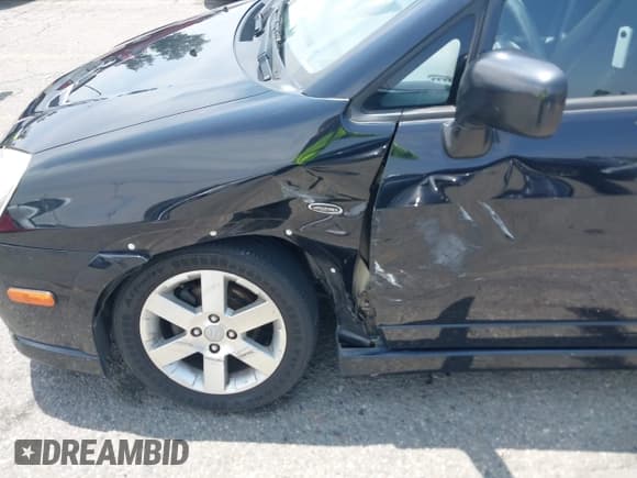 ✅ 2006 Suzuki Aerio Premium • VIN: JS2RC62H865354290 • Lot: 42582732. Wystawiony na IAAI z przebiegiem 50 869 mil. Bezpłatny archiwum sprzedaży aukcyjnych z USA i szczegółowy raport historii pojazdu na DreamBid. Zdjęcie 6.