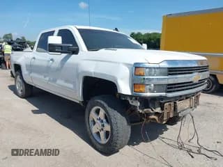 ✅ 2015 Chevrolet Silverado 2500HD LTZ • VIN: 1GC1KWE83FF596095 • Lot: 42575632. Listed on IAAI with 164,160 mi. Free auction sales archive from the USA and detailed vehicle history report at DreamBid. Image 1.