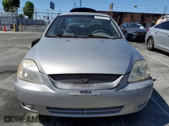 ✅ 2005 Kia Rio • VIN: KNADC125956371733 • Lot: 56203515. Listed on Copart with 54,639 mi. Free auction sales archive from the USA and detailed vehicle history report at DreamBid. Image 5.