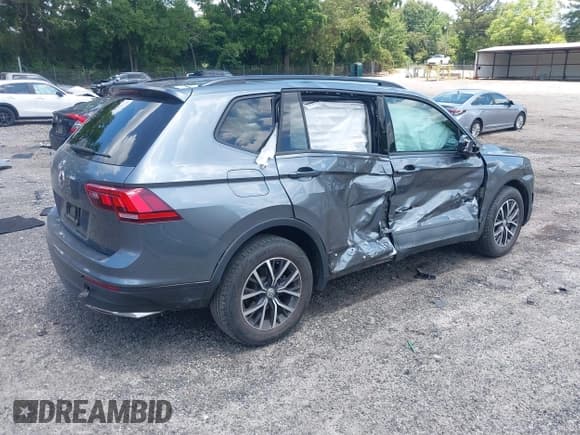 ✅ 2021 Volkswagen Tiguan S • VIN: 3VV1B7AX5MM148491 • Lot: 42561437. Listed on IAAI with 54,084 mi. Free auction sales archive from the USA and detailed vehicle history report at DreamBid. Image 4.