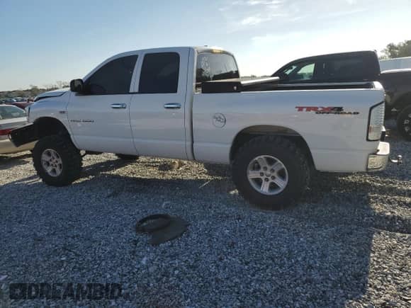 2006 Dodge 1500 Laramie z VIN 1D7HU18216S554363, wystawiony jako Copart lot #68652935 z przebiegiem 197 063 mil mil oraz Nie do naprawy • Non repairable. Historia ofert i sprzedaży dostępna na DreamBid. Obrazek 2.
