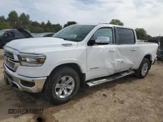 2020 Ram 1500 Laramie с VIN 1C6SRFJT7LN366563, выставлен на аукционе Copart как лот 72008685 с пробегом 99 743 миль миль и Списание • Salvage title. История ставок и продаж доступна на DreamBid. Изображение 1.