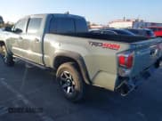 ✅ 2023 Toyota Tacoma TRD Off Road • VIN: 3TMDZ5BN2PM150289 • Lot: 43627345. Listed on IAAI with 60,603 mi. Free auction sales archive from the USA and detailed vehicle history report at DreamBid. Image 3.