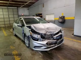 ✅ 2018 Chevrolet Cruze LS • VIN: 1G1BC5SM6J7230429 • Lot: 67087282. Listed on Copart with 19,362 mi. Free auction sales archive from the USA and detailed vehicle history report at DreamBid. Image 1.