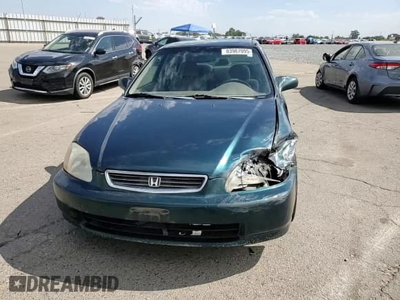 ✅ 1997 Honda Civic EX • VIN: 2HGEJ864XVH505706 • Lot: 83987095. Listed on Copart with 258,862 mi. Free auction sales archive from the USA and detailed vehicle history report at DreamBid. Image 14.