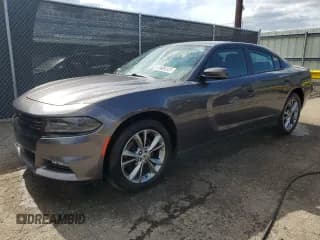 ✅ 2020 Dodge Charger SXT • VIN: 2C3CDXJGXLH109611 • Lot: 70713595. Wystawiony na Copart z przebiegiem 84 263 mil. Bezpłatny archiwum sprzedaży aukcyjnych z USA i szczegółowy raport historii pojazdu na DreamBid. Zdjęcie 1.