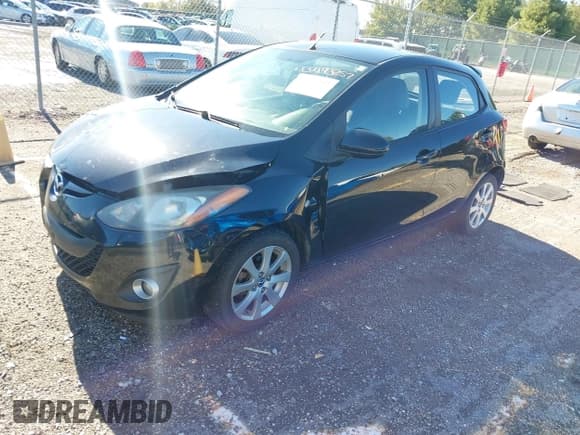 ✅ 2014 Mazda 2 Touring • VIN: JM1DE1LY7E0185827 • Лот: 43493257. Опубликован ранее на IAAI с пробегом 163 383 миль. Бесплатный доступ к архиву аукционных продаж из США и подробный отчёт об истории автомобиля на DreamBid. Изображение 2.