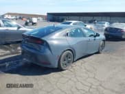 ✅ 2024 Toyota Prius LE • VIN: JTDADABU9R3022198 • Lot: 43122047. Listed on IAAI with 18,714 mi. Free auction sales archive from the USA and detailed vehicle history report at DreamBid. Image 4.