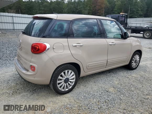 ✅ 2014 FIAT 500L Easy • VIN: ZFBCFABHXEZ027099 • Лот: 85541085. Опубликован ранее на Copart с пробегом 83 613 миль. Бесплатный доступ к архиву аукционных продаж из США и подробный отчёт об истории автомобиля на DreamBid. Изображение 3.