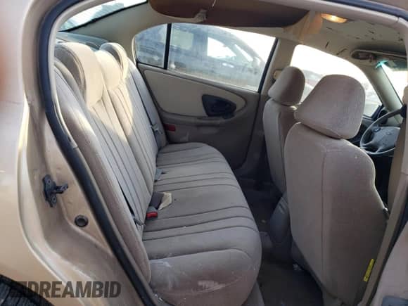 2003 Chevrolet Malibu z VIN 1G1ND52J73M580270, wystawiony jako Copart lot #85339554 z przebiegiem 102 864 mil mil oraz Czysty tytuł • Clean title. Historia ofert i sprzedaży dostępna na DreamBid. Obrazek 10.