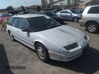 1993 Saturn SW z VIN 1G8ZK8578PZ270406, wystawiony jako IAAI lot #38286614 z przebiegiem 171 768 mil mil oraz . Historia ofert i sprzedaży dostępna na DreamBid. Obrazek 1.