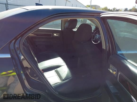 ✅ 2009 Lincoln MKZ • VIN: 3LNHM26T69R627895 • Lot: 43598746. Listed on IAAI with 218,104 mi. Free auction sales archive from the USA and detailed vehicle history report at DreamBid. Image 8.