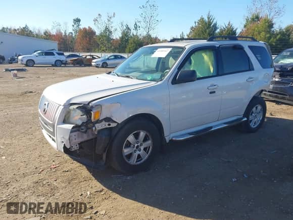 2010 Mercury Mariner z VIN 4M2CN8B70AKJ11932, wystawiony jako IAAI lot #40980162 z przebiegiem Nie podano mil oraz . Historia ofert i sprzedaży dostępna na DreamBid. Obrazek 2.