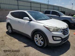2014 Hyundai Santa Fe z VIN 5XYZW3LA2EG170485, wystawiony jako Copart lot #64200015 z przebiegiem 152 769 mil mil oraz Szkoda całkowita • Salvage title. Historia ofert i sprzedaży dostępna na DreamBid. Obrazek 4.