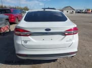 ✅ 2018 Ford Fusion SE • VIN: 3FA6P0LU7JR158282 • Lot: 43618839. Listed on IAAI with 103,677 mi. Free auction sales archive from the USA and detailed vehicle history report at DreamBid. Image 16.