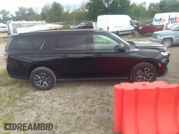 ✅ 2023 Chevrolet Suburban Z71 • VIN: 1GNSKDKD2PR287610 • Lot: 36970356. Listed on IAAI with 3,038 mi. Free auction sales archive from the USA and detailed vehicle history report at DreamBid. Image 13.