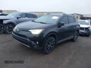 ✅ 2017 Toyota RAV4 SE • VIN: 2T3JFREV4HW572689 • Lot: 43730901. Listed on IAAI with 142,338 mi. Free auction sales archive from the USA and detailed vehicle history report at DreamBid. Image 17.