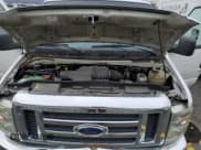 ✅ 2010 Ford Econoline Cargo Commercial • VIN: 1FTNE2EW6ADA01583 • Lot: 85033044. Listed on Copart with 98,464 mi. Free auction sales archive from the USA and detailed vehicle history report at DreamBid. Image 11.