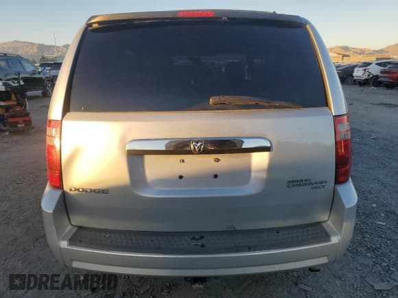 ✅ 2010 Dodge Grand Caravan SXT • VIN: 2D4RN5D19AR229733 • Лот: 91013625. Опубликован ранее на Copart с пробегом 197 139 миль. Бесплатный доступ к архиву аукционных продаж из США и подробный отчёт об истории автомобиля на DreamBid. Изображение 6.