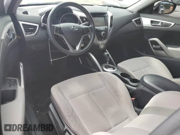 2013 Hyundai Veloster w/Gray Int с VIN KMHTC6AD0DU167414, выставлен на аукционе Copart как лот 73476894 с пробегом 119 928 миль миль и Списание • Salvage title. История ставок и продаж доступна на DreamBid. Изображение 8.