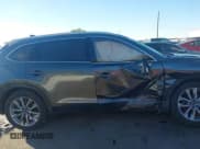 ✅ 2023 Mazda CX-9 Carbon Edition • VIN: JM3TCBDY9P0631587 • Lot: 43571828. Listed on IAAI with 62,854 mi. Free auction sales archive from the USA and detailed vehicle history report at DreamBid. Image 13.