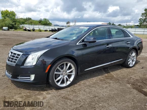 ✅ 2014 Cadillac XTS Premium • VIN: 2G61R5S38E9215110 • Лот: 68746295. Опубликован ранее на Copart с пробегом 77 342 миль. Бесплатный доступ к архиву аукционных продаж из США и подробный отчёт об истории автомобиля на DreamBid. Изображение 1.