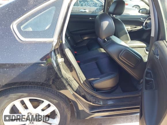 ✅ 2014 Chevrolet Impala LTZ • VIN: 2G1WC5E38E1185498 • Lot: 43716267. Listed on IAAI with 143,822 mi. Free auction sales archive from the USA and detailed vehicle history report at DreamBid. Image 8.