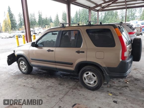 ✅ 2004 Honda CR-V LX • VIN: JHLRD78414C059335 • Lot: 43621422. Wystawiony na IAAI z przebiegiem 265 466 mil. Bezpłatny archiwum sprzedaży aukcyjnych z USA i szczegółowy raport historii pojazdu na DreamBid. Zdjęcie 14.