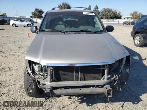 ✅ 2002 GMC Envoy SLE • VIN: 1GKDS13S822359901 • Лот: 71940774. Опубликован ранее на Copart с пробегом 188 580 миль. Бесплатный доступ к архиву аукционных продаж из США и подробный отчёт об истории автомобиля на DreamBid. Изображение 5.