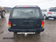 ✅ 1997 Jeep Cherokee Sport • VIN: 1J4FJ67S3VL536152 • Lot: 42013930. Listed on IAAI with 142,226 mi. Free auction sales archive from the USA and detailed vehicle history report at DreamBid. Image 16.