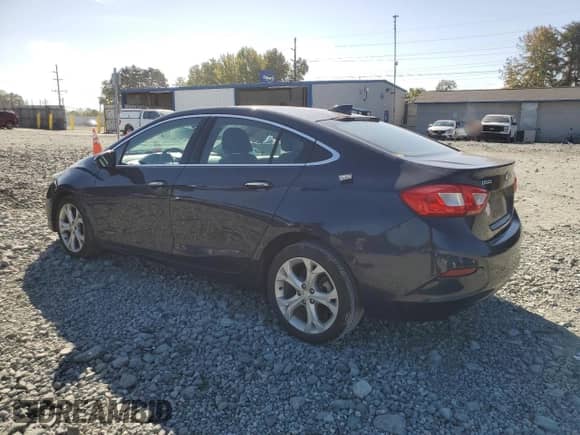 2016 Chevrolet Cruze Premier with VIN 1G1BG5SM1G7299543, listed as a Copart auction lot 82184465 with 150,629 mi miles and Salvage title. Bid and sale history available at DreamBid. Image 2.