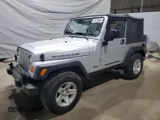 ✅ 2003 Jeep Wrangler Rubicon • VIN: 1J4FA69SX3P322715 • Lot: 63976635. Listed on Copart with 167,842 mi. Free auction sales archive from the USA and detailed vehicle history report at DreamBid. Image 1.