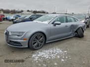 ✅ 2017 Audi A7 Premium Plus • VIN: WAUW2AFC1HN052602 • Lot: 95736725. Listed on Copart with Not provided. Free auction sales archive from the USA and detailed vehicle history report at DreamBid. Image 1.