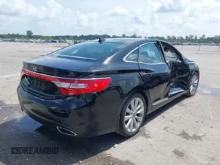 ✅ 2013 Hyundai Azera • VIN: KMHFH4JG0DA310957 • Лот: 42451780. Опубликован ранее на IAAI с пробегом 82 827 миль. Бесплатный доступ к архиву аукционных продаж из США и подробный отчёт об истории автомобиля на DreamBid. Изображение 4.