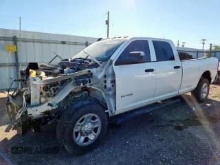 ✅ 2021 Ram 2500 Tradesman • VIN: 3C6UR5HL2MG515965 • Lot: 90258875. Listed on Copart with 189,734 mi. Free auction sales archive from the USA and detailed vehicle history report at DreamBid. Image 1.