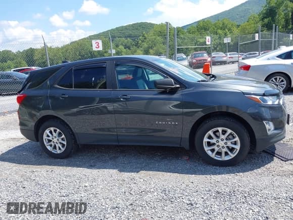 ✅ 2021 Chevrolet Equinox LS • VIN: 2GNAXSEV0M6155832 • Lot: 42981882. Listed on IAAI with 41,099 mi. Free auction sales archive from the USA and detailed vehicle history report at DreamBid. Image 13.