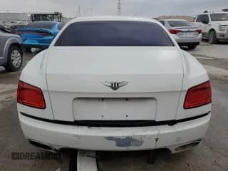 ✅ 2014 Bentley Flying Spur • VIN: SCBEC9ZAXEC091476 • Лот: 47169844. Опубликован ранее на Copart с пробегом 48 952 миль. Бесплатный доступ к архиву аукционных продаж из США и подробный отчёт об истории автомобиля на DreamBid. Изображение 6.