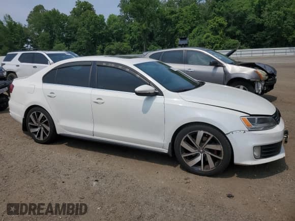 ✅ 2013 Volkswagen Jetta Autobahn • VIN: 3VW4A7AJ2DM395295 • Lot: 60647345. Listed on Copart with 198,802 mi. Free auction sales archive from the USA and detailed vehicle history report at DreamBid. Image 4.