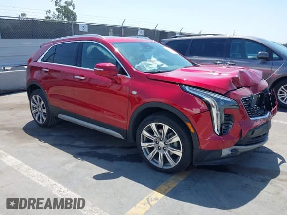 ✅ 2021 Cadillac XT4 FWD Premium Luxury • VIN: 1GYFZCR48MF004849 • Лот: 42131896. Опубликован ранее на IAAI с пробегом 9 864 миль. Бесплатный доступ к архиву аукционных продаж из США и подробный отчёт об истории автомобиля на DreamBid. Изображение 1.