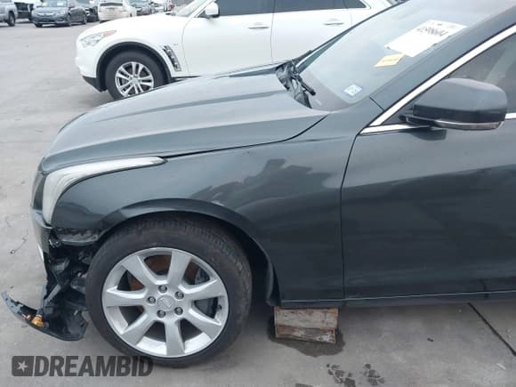 ✅ 2015 Cadillac ATS Performance RWD • VIN: 1G6AC5SX2F0136547 • Lot: 41598604. Wystawiony na IAAI z przebiegiem 80 460 mil. Bezpłatny archiwum sprzedaży aukcyjnych z USA i szczegółowy raport historii pojazdu na DreamBid. Zdjęcie 18.