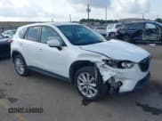 ✅ 2013 Mazda CX-5 Grand Touring • VIN: JM3KE2DE8D0166792 • Lot: 42432876. Wystawiony na IAAI z przebiegiem 105 898 mil. Bezpłatny archiwum sprzedaży aukcyjnych z USA i szczegółowy raport historii pojazdu na DreamBid. Zdjęcie 1.