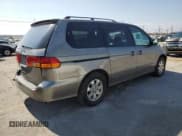 ✅ 2002 Honda Odyssey EX-L • VIN: 5FNRL18952B039985 • Lot: 81940645. Listed on Copart with 216,805 mi. Free auction sales archive from the USA and detailed vehicle history report at DreamBid. Image 3.