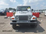 ✅ 2002 Jeep Wrangler X • VIN: 1J4FA39S02P748202 • Lot: 43266082. Wystawiony na IAAI z przebiegiem 199 437 mil. Bezpłatny archiwum sprzedaży aukcyjnych z USA i szczegółowy raport historii pojazdu na DreamBid. Zdjęcie 12.