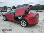 ✅ 2020 Tesla Model X Long Range • VIN: 5YJXCBE23LF228589 • Лот: 70537725. Опубликован ранее на Copart с пробегом 69 937 миль. Бесплатный доступ к архиву аукционных продаж из США и подробный отчёт об истории автомобиля на DreamBid. Изображение 2.