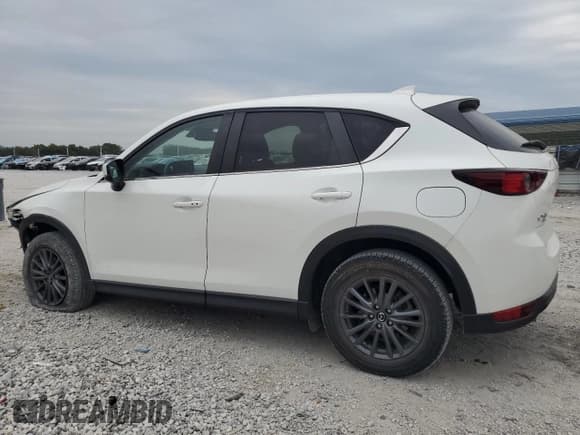 ✅ 2021 Mazda CX-5 Touring • VIN: JM3KFBCM3M0452068 • Lot: 82182915. Wystawiony na Copart z przebiegiem 24 079 mil. Bezpłatny archiwum sprzedaży aukcyjnych z USA i szczegółowy raport historii pojazdu na DreamBid. Zdjęcie 2.