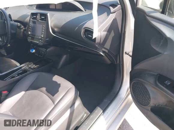 2021 Toyota Prius L Eco with VIN JTDKAMFU5M3137298, listed as a IAAI auction lot 42270937 with 38,828 mi miles and . Bid and sale history available at DreamBid. Image 5.