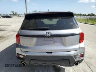✅ 2022 Honda Passport EX-L • VIN: 5FNYF8H50NB018717 • Lot: 65234043. Listed on Copart with 30,005 mi. Free auction sales archive from the USA and detailed vehicle history report at DreamBid. Image 6.