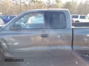 ✅ 2002 Dodge Dakota • VIN: 1B7GG12X72S664670 • Lot: 41334622. Wystawiony na IAAI z przebiegiem Nie podano. Bezpłatny archiwum sprzedaży aukcyjnych z USA i szczegółowy raport historii pojazdu na DreamBid. Zdjęcie 13.